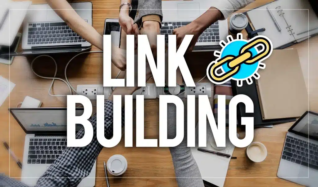 a group of people working with laptops to buy SEO backlinks
